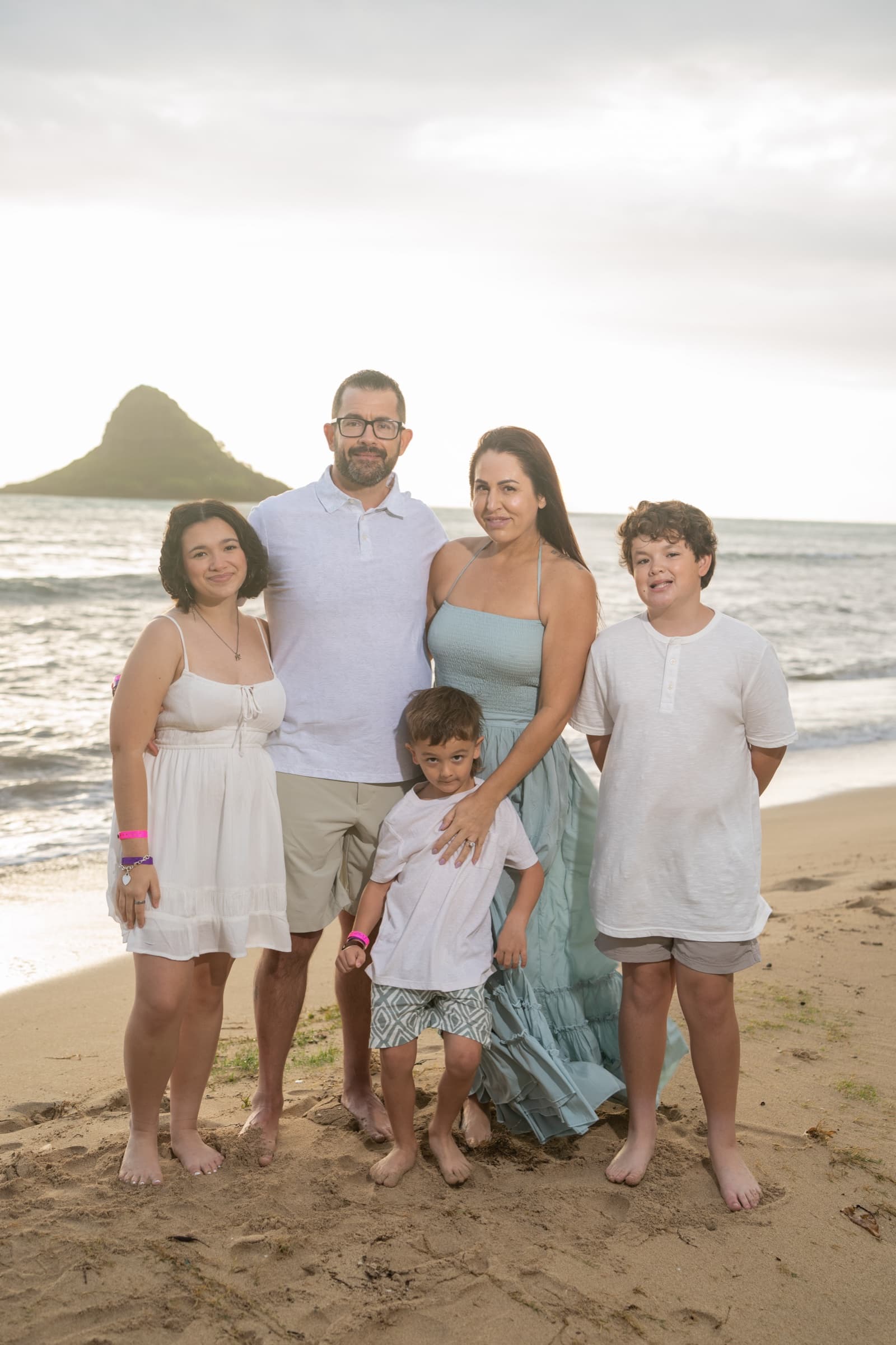 Todd and Kallie Hollander with their family on the beach