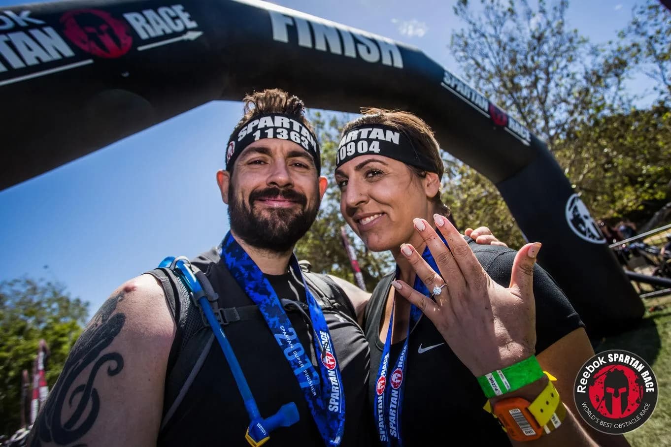 Todd and Kallie Hollander celebrating together after a Spartan race